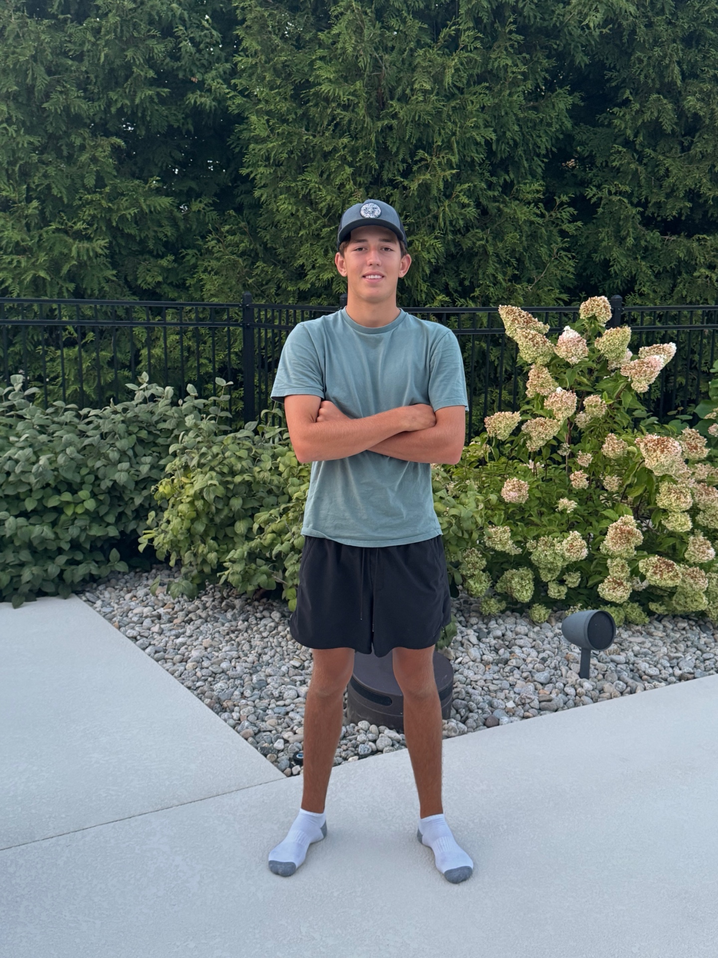 Peyton Strobel, CEO of PGE Junk Removal, outside a Kansas City metro home